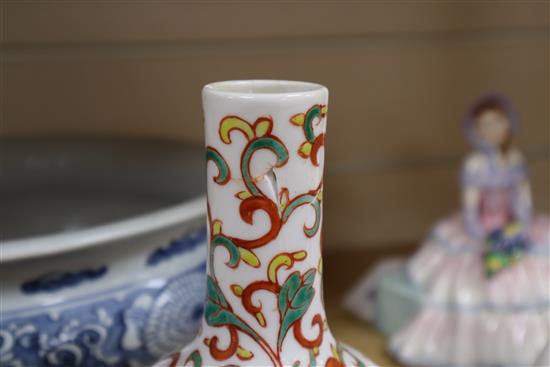 A Chinese blue and white large tripod censer, a peach bloom brush washer and a famille verte vase